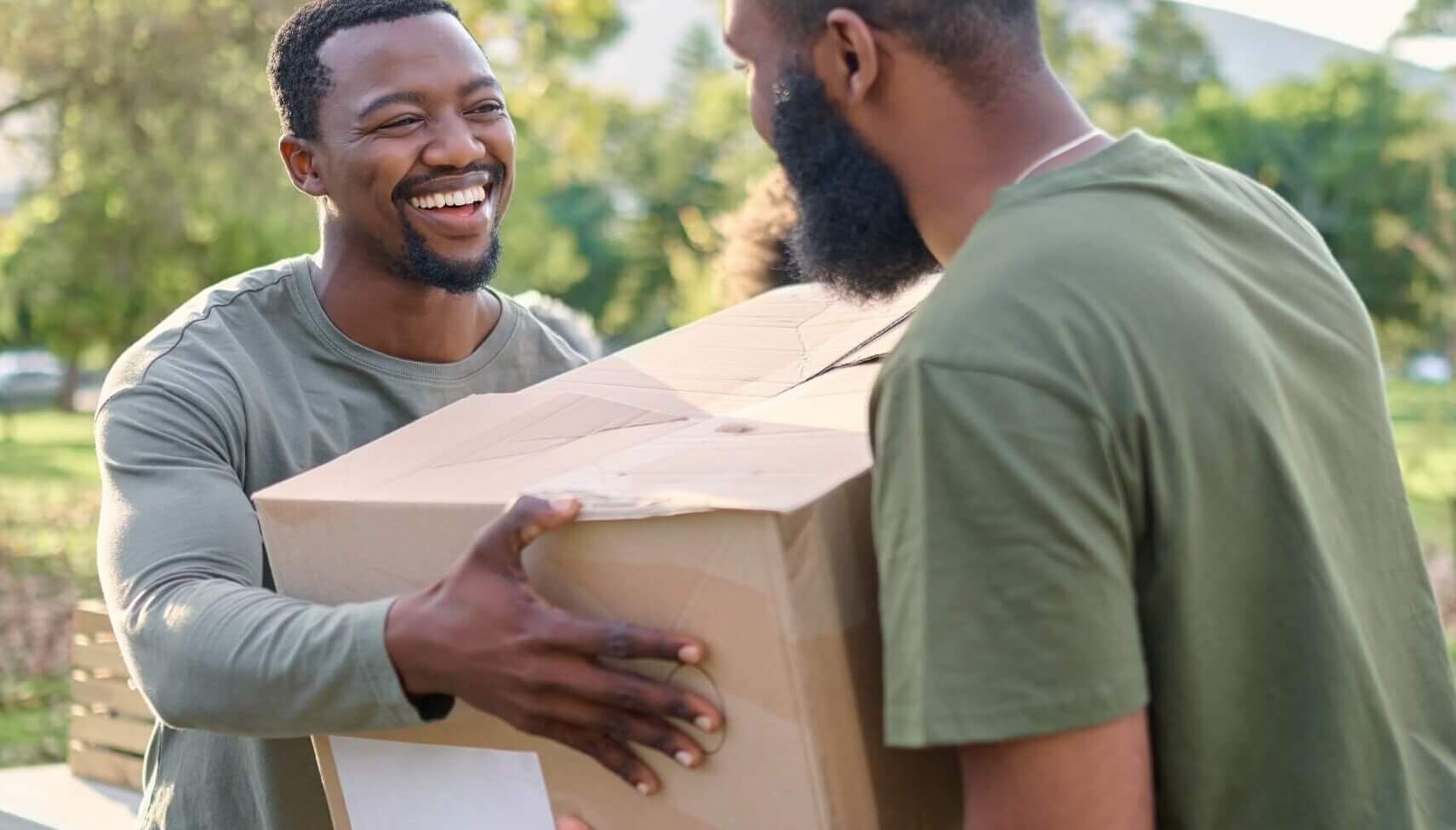 black man charity and holding box in park of dona 2023 02 07 21 57 49 utc cropped