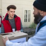 diverse group of volunteers with donation boxes st 2021 12 14 21 34 23 utc cropped